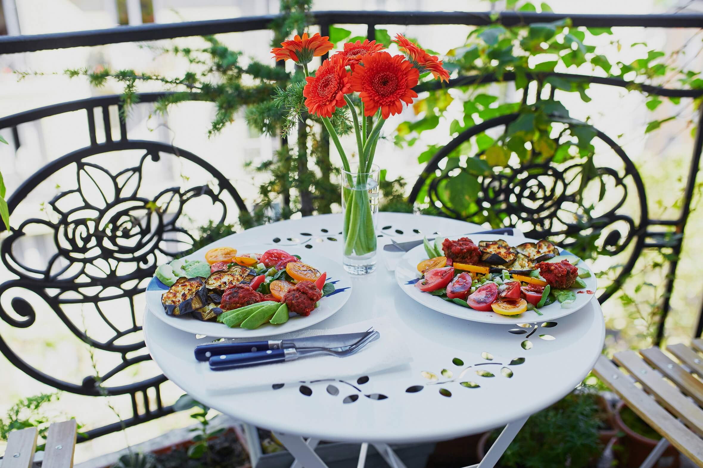 gluten free Paris lunch on outdoor cafe with flowers and fresh food.