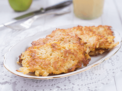 Kartoffelpuffer is a fried pancake made from grated potatoes, eggs, and flour.