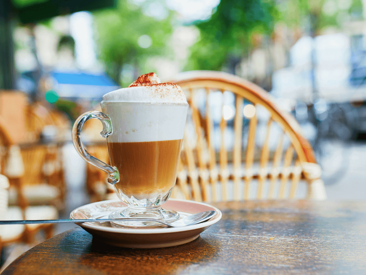drinking latte for breakfast in italy at cafe.