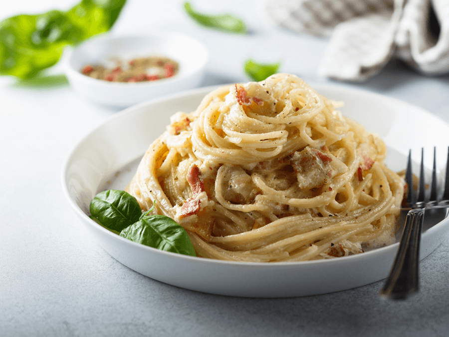 eating soy free in italy for lunch and enjoying a freshly made pasta dish.