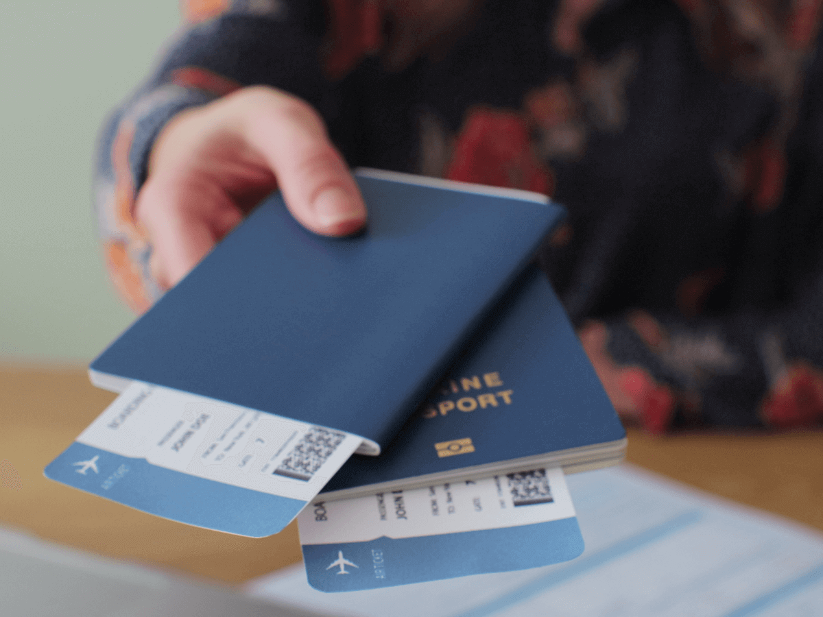 Traveler handing tickets when traveling by plane in europe.