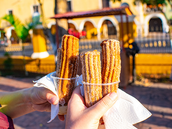 image of churros outside in Spain for a nut free dessert in spain
